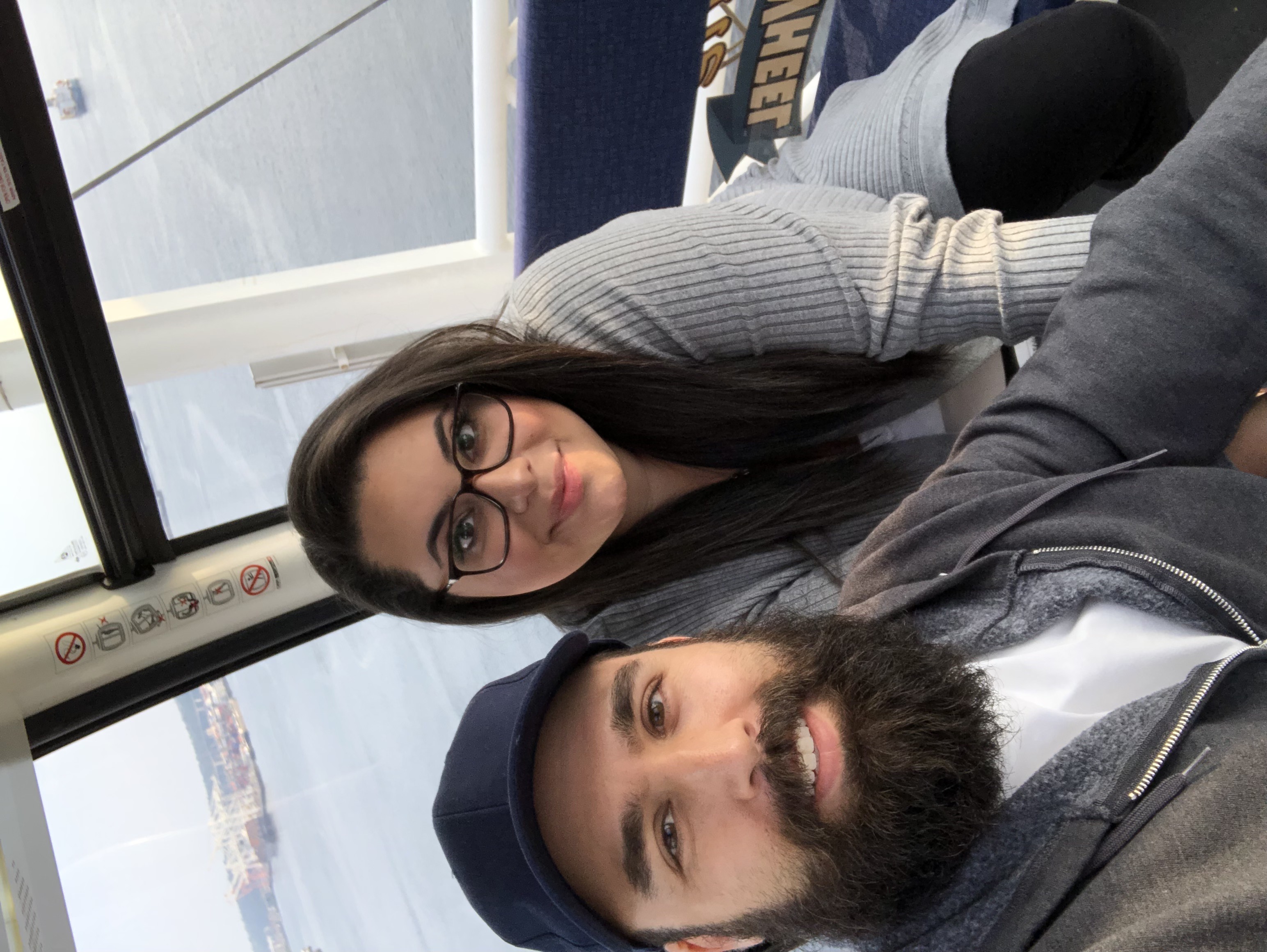 travel couple couple on ferris wheel in seattle washington great wheel